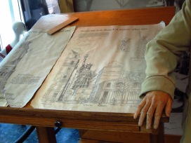 Display of plans at the Liberty Island gift shop. It is accompanied by a waxwork of Bartholdi