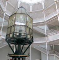 This huge lighthouse lamp towers over visitors in the Grand Gallery.