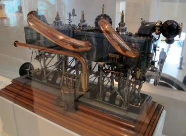 Ooh, shiny! This is a model of a steam engine used in 1900 on a torpedo destroyer.
